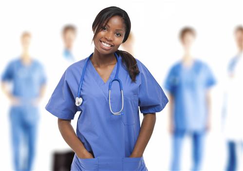 Nurse in scrubs smiling