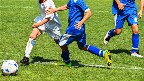 Kids playing soccer
