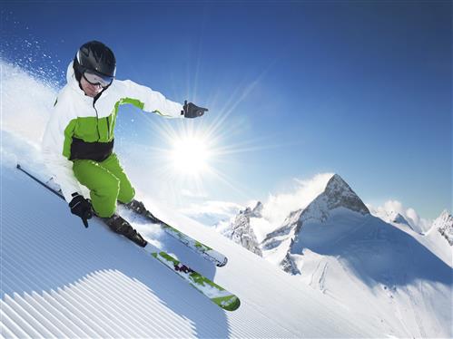 Man skiing down slope