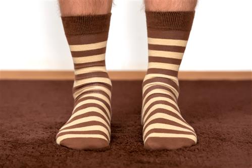 Closeup of feet in striped socks