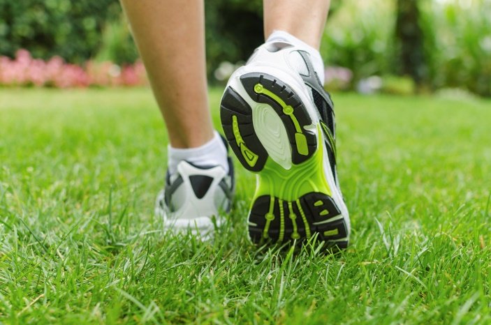 Closeup of someone walking in sneakers